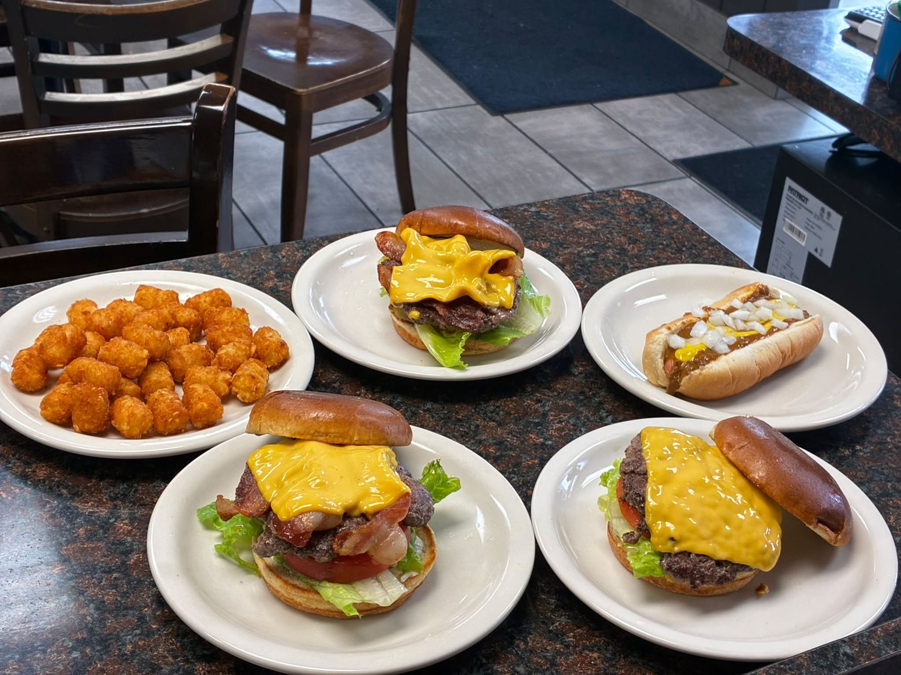 Burgers, a coney dog and tater tots