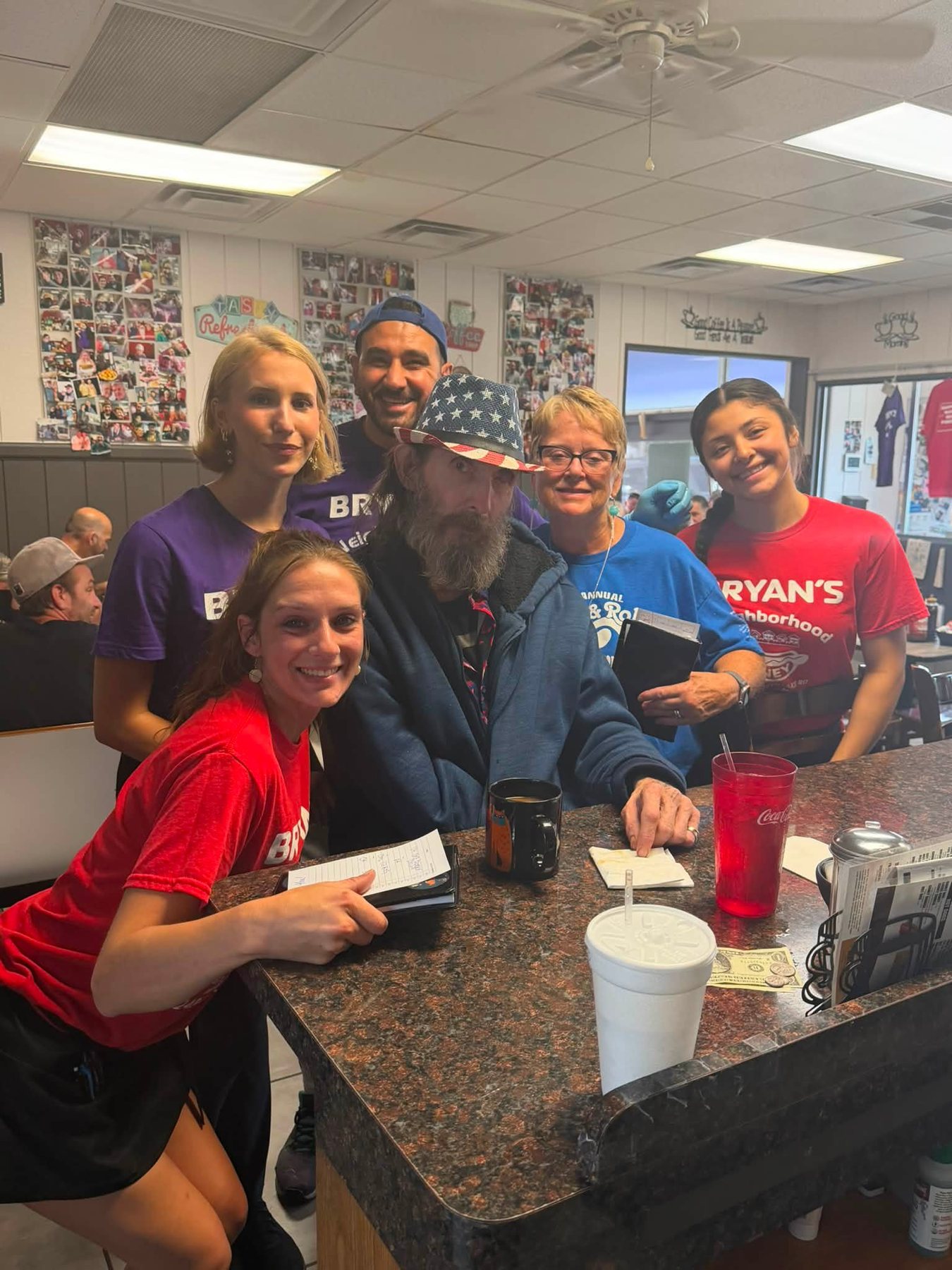 Crew and regulars at a table