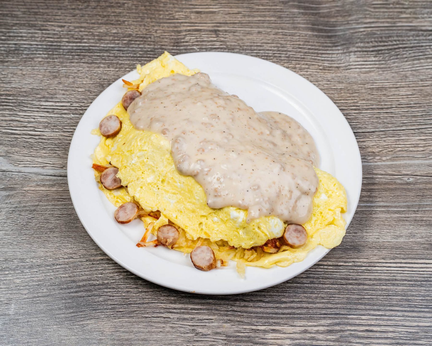 Omelette smothered in sausage gravy